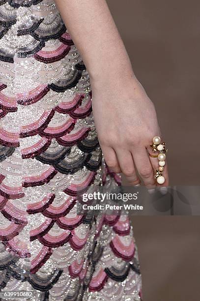 Model, jewel detail, walks the runway during the Georges Hobeika Spring Summer 2017 show as part of Paris Fashion Week on January 23, 2017 in Paris,...