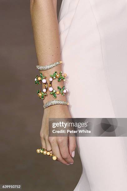 Model, jewel detail, walks the runway during the Georges Hobeika Spring Summer 2017 show as part of Paris Fashion Week on January 23, 2017 in Paris,...