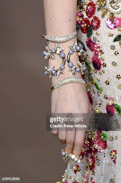 Model, jewel detail, walks the runway during the Georges Hobeika Spring Summer 2017 show as part of Paris Fashion Week on January 23, 2017 in Paris,...