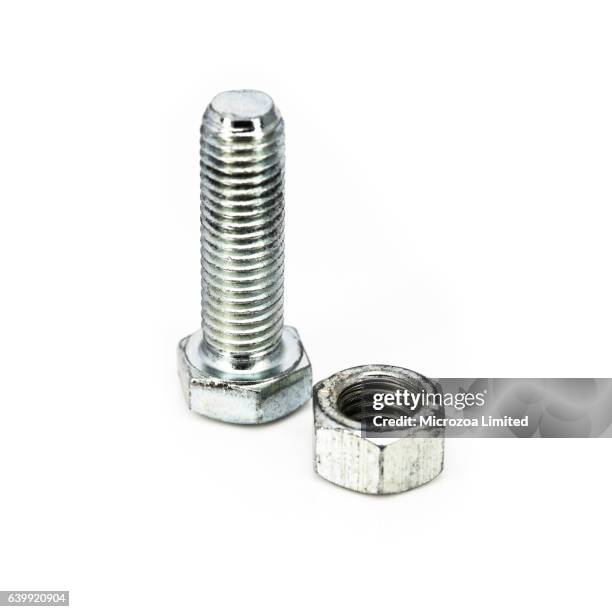 a steel nut and bolt - microzoa stock pictures, royalty-free photos & images