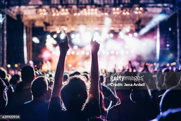 number one fan - rock music stock pictures, royalty-free photos & images