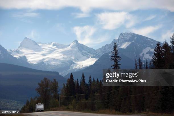 on the road down the alcan highway - alcan highway stock pictures, royalty-free photos & images