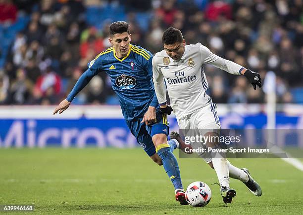 Carlos Henrique Casemiro of Real Madrid battles for the ball with Pedro Pablo Hernandez of Celta de Vigo during their Copa del Rey 2016-17...