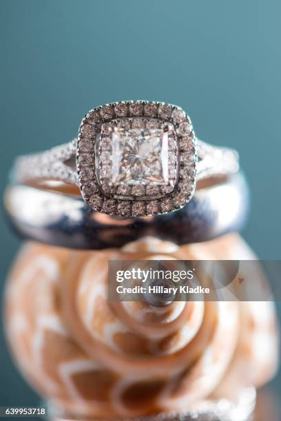 expensive wedding rings amongst seashells - square ring stock pictures, royalty-free photos & images