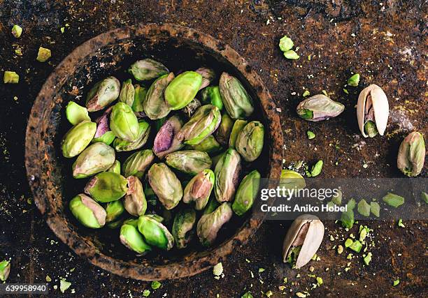 pistachio nuts - pistachio nut stock pictures, royalty-free photos & images