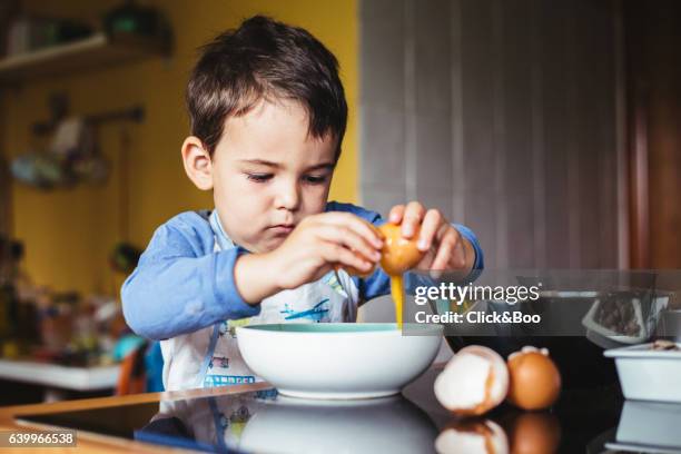 cooking is superb! - kid chef stock pictures, royalty-free photos & images