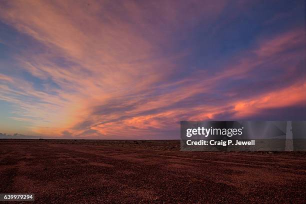 clouds at dusk over the australian outback - great victoria desert stock pictures, royalty-free photos & images