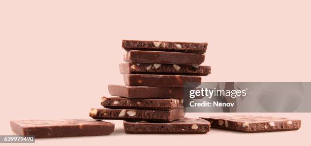 chocolate bar - chocolate pieces stock pictures, royalty-free photos & images