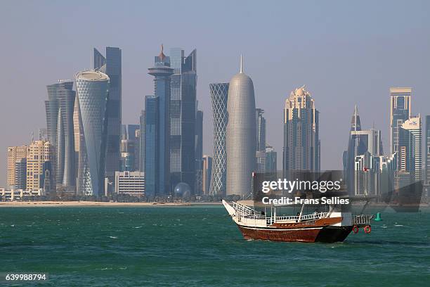 skyline of doha financial center, qatar - qatari flag stock pictures, royalty-free photos & images