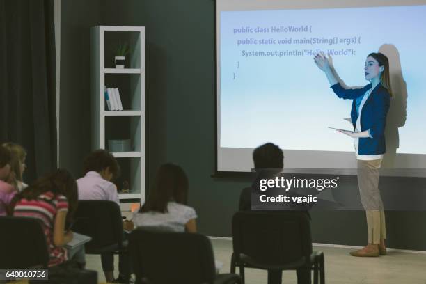 kids coding in school. - elementary classroom projector stock pictures, royalty-free photos & images