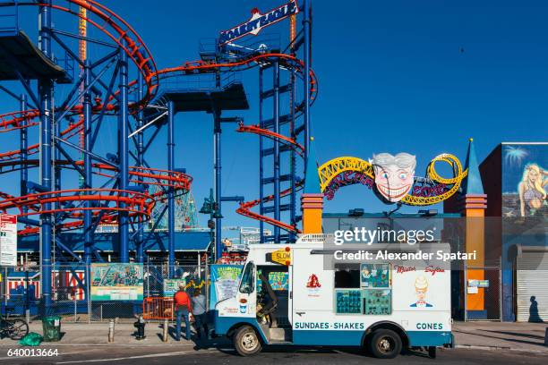ice cream truck in the amusement park in coney island, brooklyn, new york city, ny, usa - luna park coney island stock pictures, royalty-free photos & images