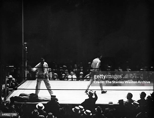 Max Schmeling walks to his corner after knocking out Young Stribling in the 15th round to retain his title of World Heavyweight Champion at Municipal...