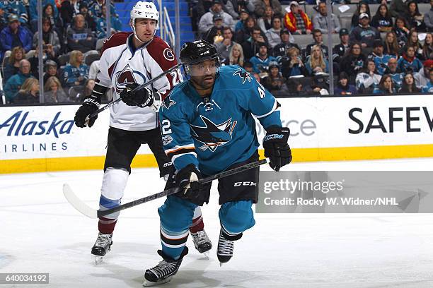 Joel Ward of the San Jose Sharks skates against Patrick Wiercioch of the Colorado Avalanche at SAP Center on January 21, 2017 in San Jose, California.