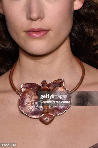 Model, necklace detail, walks the runway during the Christian Dior Spring Summer 2017 show as part of Paris Fashion Week on January 23, 2017 in...