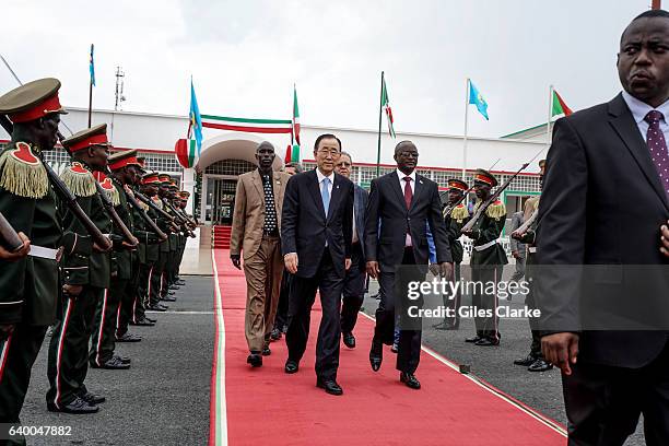 Secretary General Ban Ki-moon walks alongside Burundi's foreign minister Alain Nyamitwe. Both take part in a farewell ceremony to the visiting United...