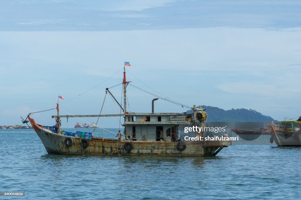 Fisherman boats anchored at Kota Kinabalu jetty