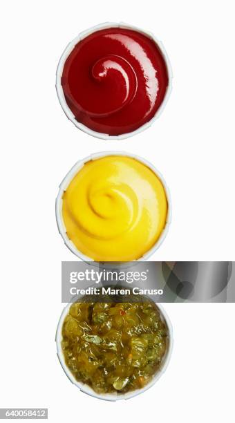 ketchup, mustard, and relish in paper cups - ketchup stock-fotos und bilder