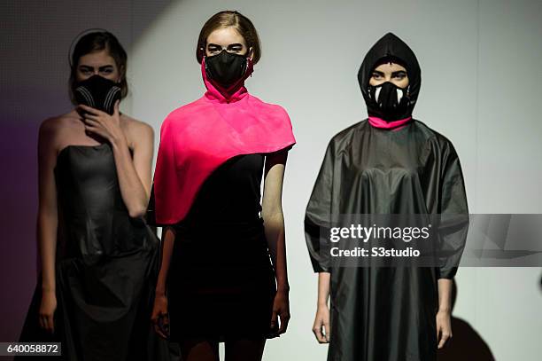 Model showcases designs by Nina Griffee during the Day 2 of the Hong Kong Fashion Week for Spring / Summer 2014 at the Hong Kong Convention and...