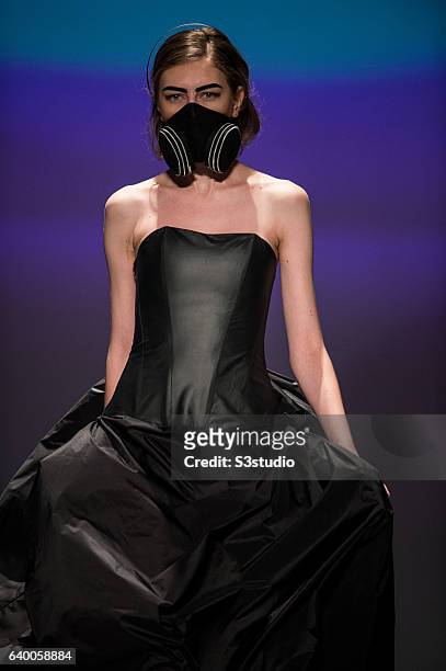 Model showcases designs by Nina Griffee during the Day 2 of the Hong Kong Fashion Week for Spring / Summer 2014 at the Hong Kong Convention and...
