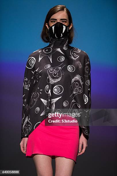 Model showcases designs by Nina Griffee during the Day 2 of the Hong Kong Fashion Week for Spring / Summer 2014 at the Hong Kong Convention and...