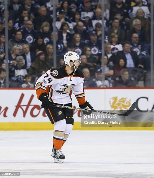 Joseph Cramarossa of the Anaheim Ducks keeps an eye on the play during third period action against the Winnipeg Jets at the MTS Centre on January 23,...
