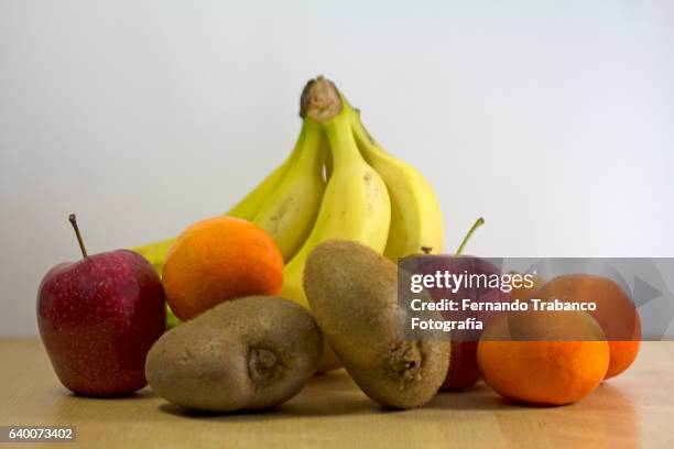 fruit on white background - drosophila stock-fotos und bilder