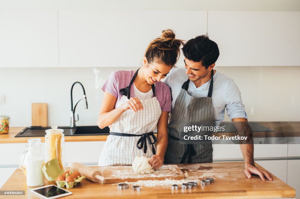 Couple making cookies