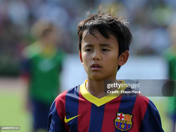 Takefusa Kubo of FC Barcelona in action during the U-12 Junior Soccer World Challenge 2013 final match between FC Barcelona and Liverpool FC at...