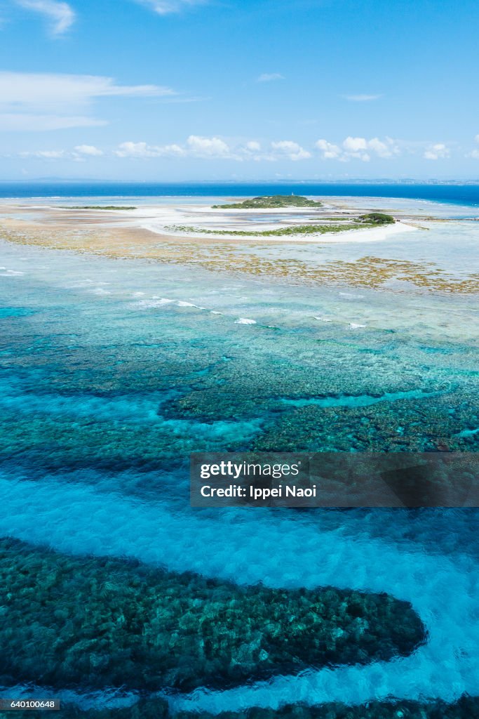 Aerial view of coral reef and tropical island, Okinawa, Japan