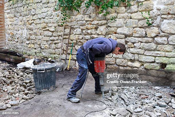 repairing the surface of a patio - jackhammer stock pictures, royalty-free photos & images
