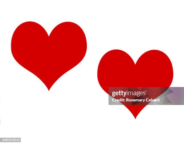 romance and friendship represents by two red hearts on white. - heart shape stock pictures, royalty-free photos & images