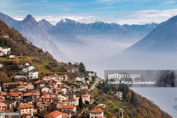 village on monte bre in lugano, switzerland - monte brè stock pictures, royalty-free photos & images