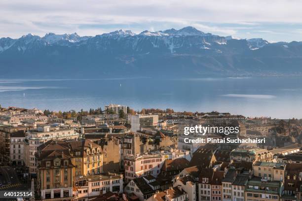 view over lausanne and lake geneva from the cathedral - lausanne stock-fotos und bilder