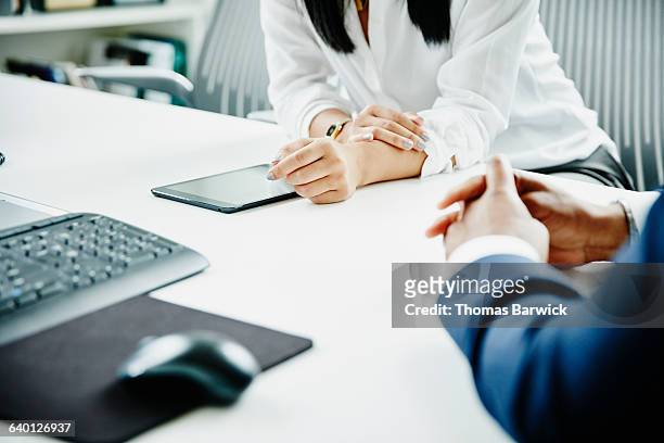 businessman and businesswoman working on project - アクセス ストックフォトと画像