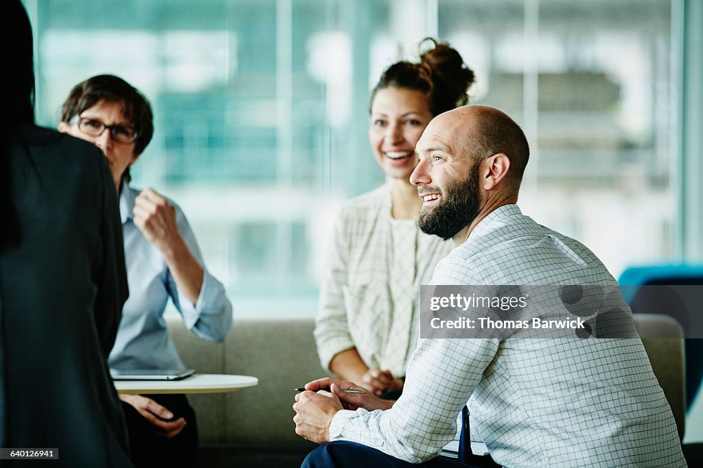Businessman in discussion with colleagues