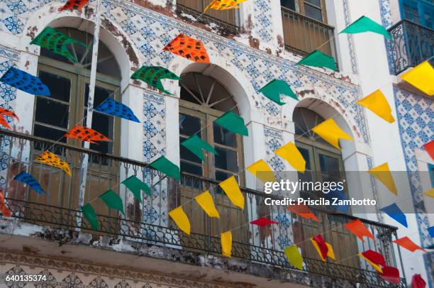 historic center of são luís, decorated for the june festivals with colorful flags - sao luis stock-fotos und bilder