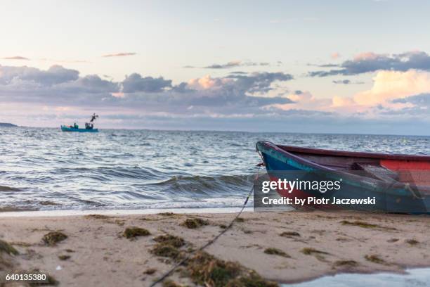 boat on beach - baltic sea poland stock pictures, royalty-free photos & images