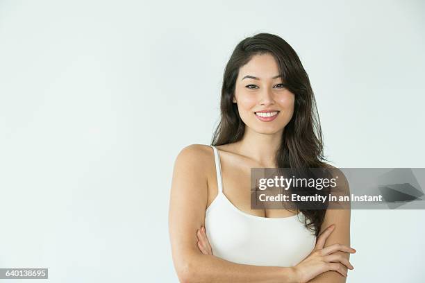 beautiful woman smiling at the camera - decote - fotografias e filmes do acervo