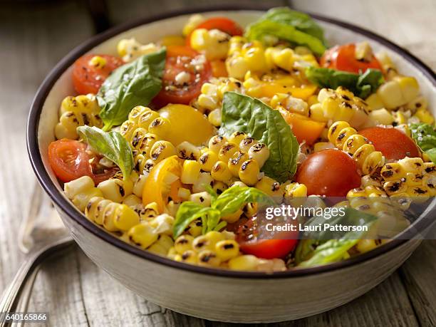 grilled corn salad with tomatoes and basil - mache stock pictures, royalty-free photos & images