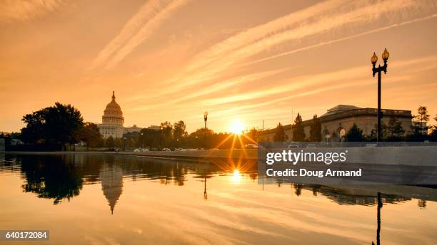 capitol building and reflecting pool in washington d.c, usa at sunrise - reflecting pool stock pictures, royalty-free photos & images