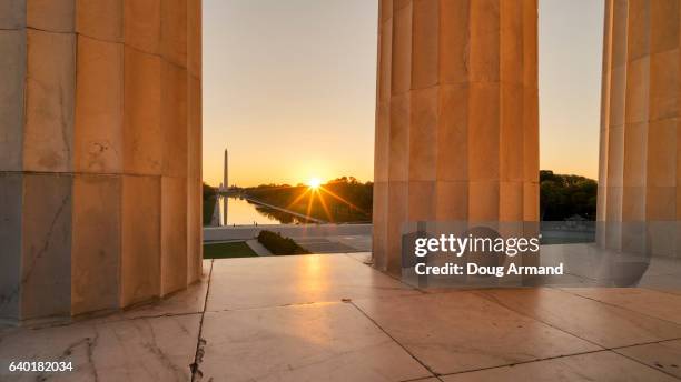 sunrise from steps of lincoln memorial in washington, dc - reflecting pool stock-fotos und bilder