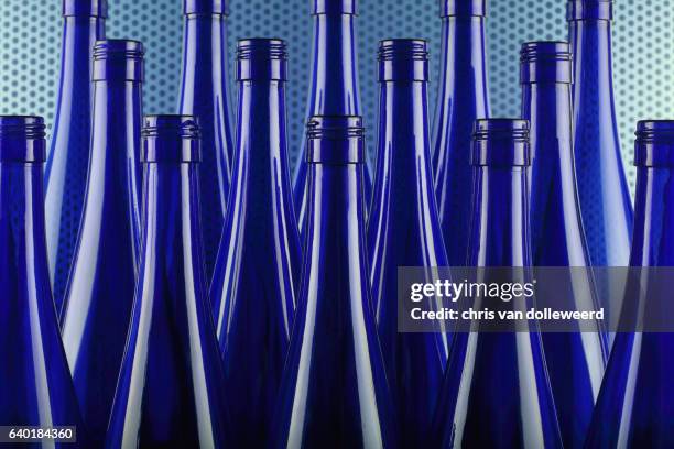 blue bottles - cristal azul fotografías e imágenes de stock