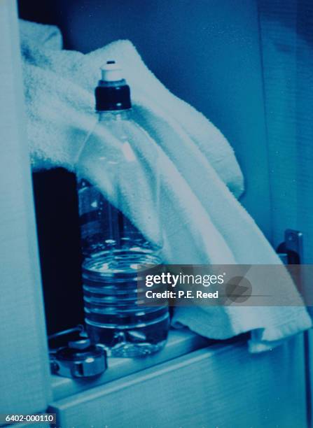 bottle of water and towel - locker stock pictures, royalty-free photos & images