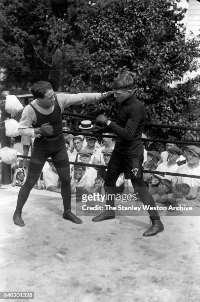 Johnny Dundee, top featherweight contender training for title fight with Eugene Cirgui at camp in Orange, New Jersey, July 15, 1923.