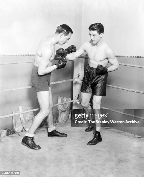 Sammy Mandell the former world lightweight champion sparring with Jackie Fields at Mullen's Gym in Chicago, Illinois, February 2, 1928.