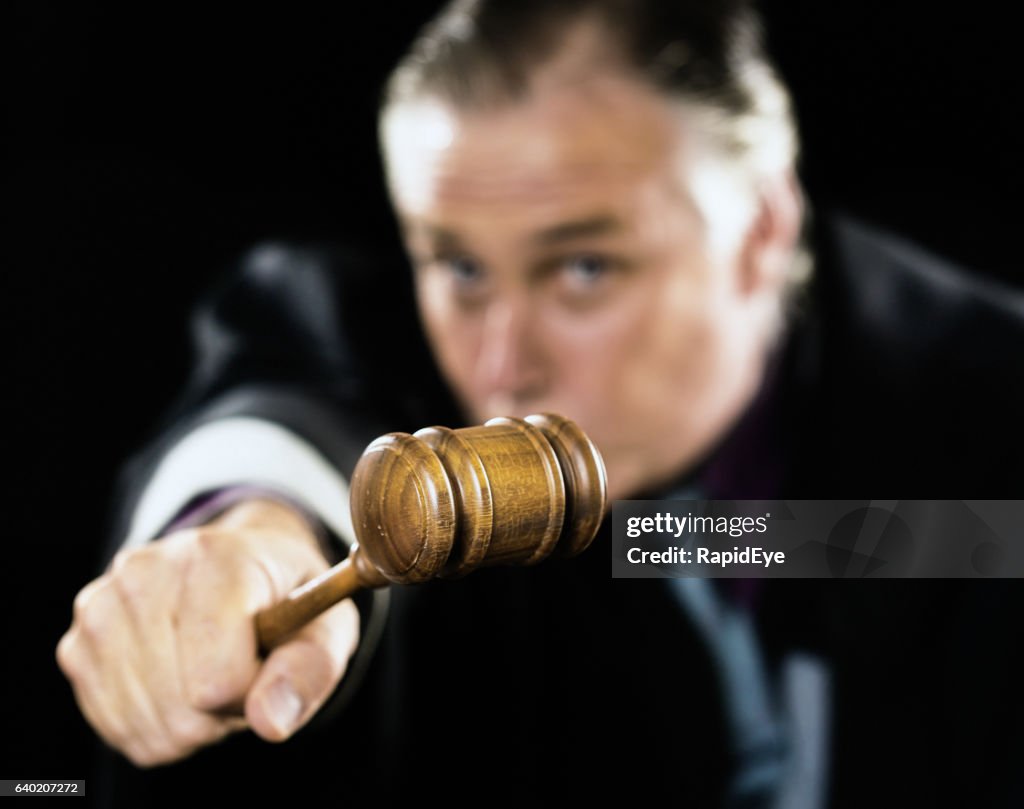 Gavel is held out as a threat by angry judge