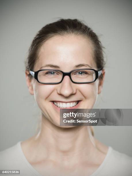 close-up portrait of woman smiling - lightskinned stock pictures, royalty-free photos & images