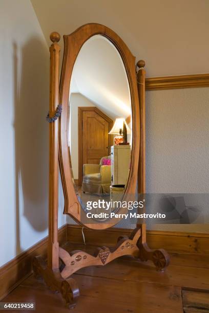 antique oval wooden revolving dress mirror - oval room stock pictures, royalty-free photos & images