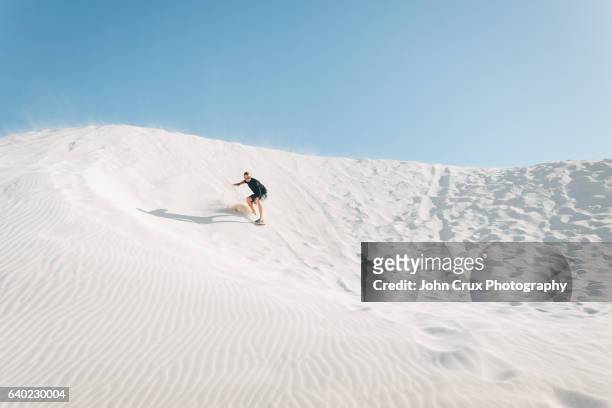lancelin sand dune boarding - australia occidental fotografías e imágenes de stock