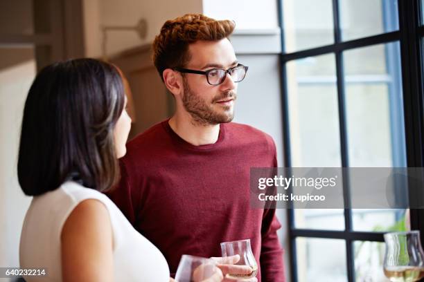 enjoying wine and great conversation - people speaking great background stock pictures, royalty-free photos & images